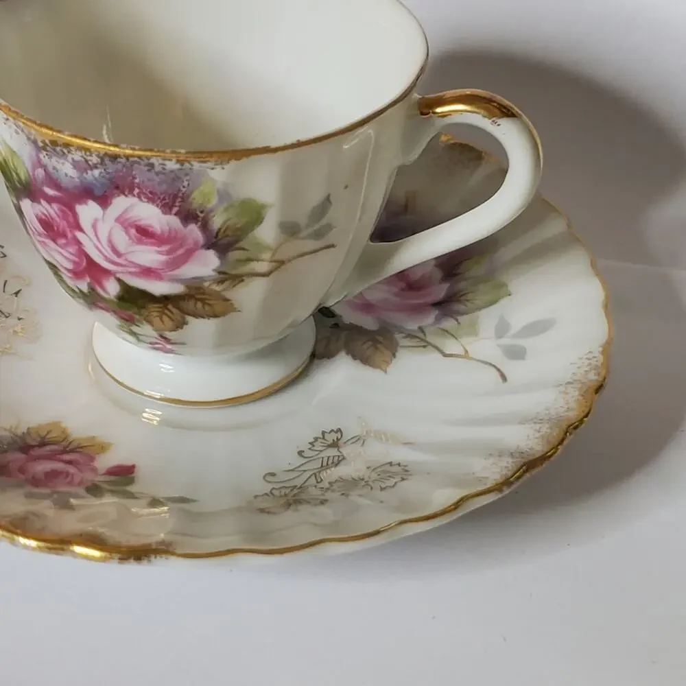 Vintage Mid Century Marco Tea Cup and Saucer Set pink rose gold trim Great condi